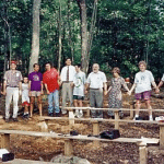 outdoor chapel workers holding hands